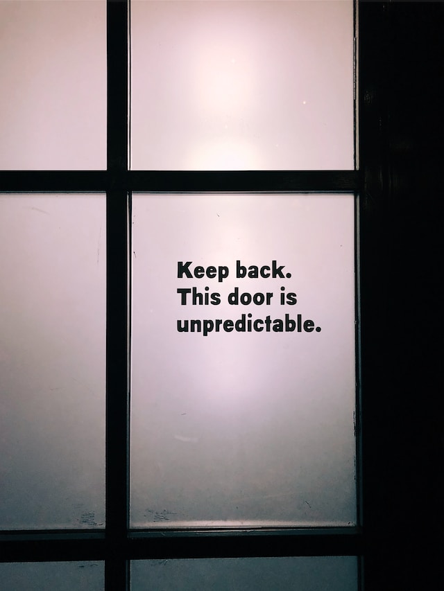 Keep back. This door is unpredictable.